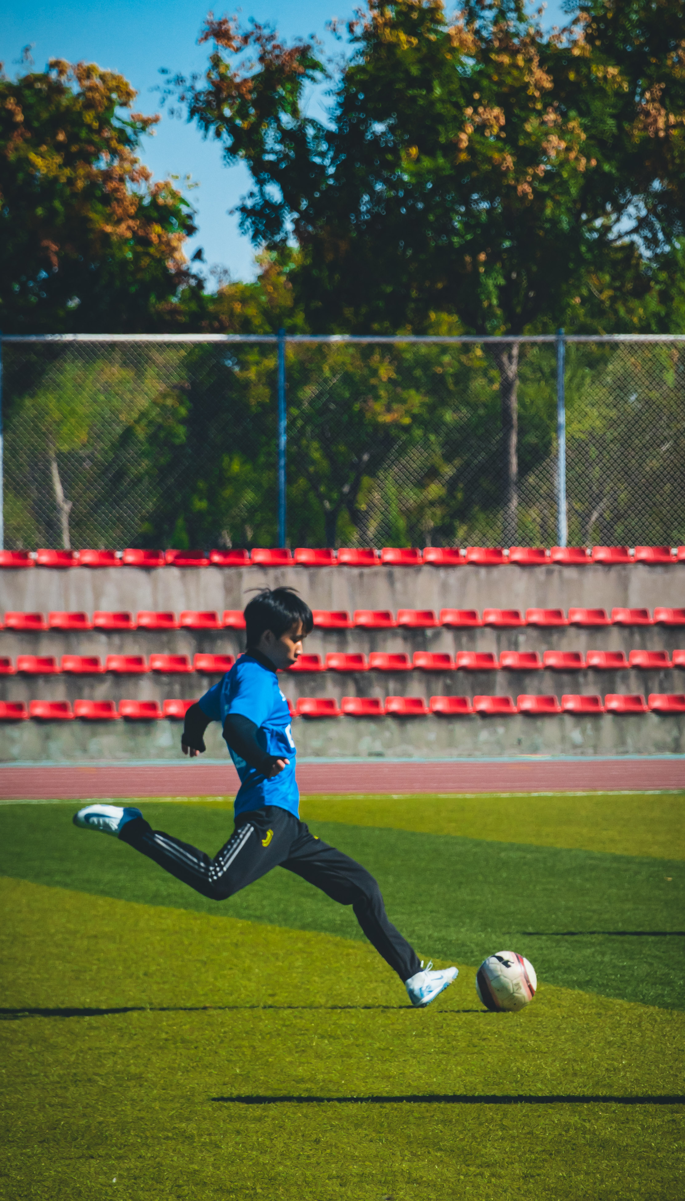 Playing football on the pitch